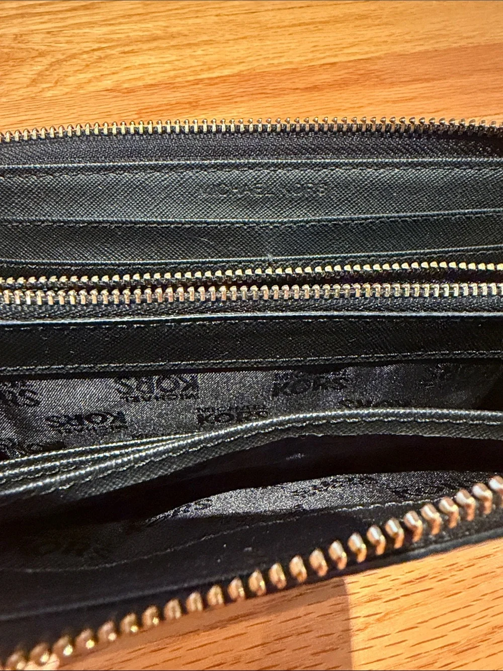 Michael Kors Black Pebbled Leather Zip Wallet with Gold Plate